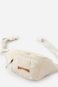 RIP CURL - Nomad Cord Waist Bag - Off White Produktbild - Keep your essentials close at hand with the Nomad Cord Waist Bag. Made from comfortable cotton corduroy, it's a trendy accessory for hands-free convenience.