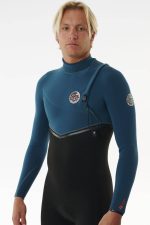 RIP CURL - E Bomb 3/2 Zip Free Wetsuit Produktbild - Enjoy the perfect balance of flexibility and warmth with the Rip Curl E-Bomb 3/2 Zip Free Wetsuit. Designed to optimize your surf sessions, this wetsuit incorporates advanced features for ultimate performance. The E7 and E6 thermo lining neoprene ensures superior insulation and freedom of movement. With critical stress point taping and E6 tape, this suit offers exceptional durability. Sealed cuffs keep cold water from rushing in, and an external key pocket provide added convenience. Drop in with confidence and surf to your full potential in the E-Bomb 3/2 Zip Free Wetsuit.
